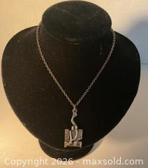 MaxSold Auction: 1970s Finnish abstract designer Jorma Laine for Torun Hopeau, pendant - Ottawa (Ontario, Canada) SELLER MANAGED Downsizing Online Auction - Tall Forest Drive