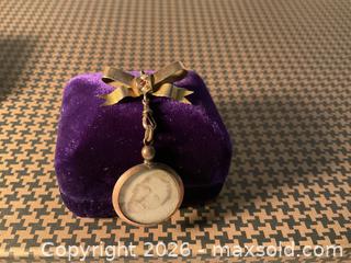 MaxSold Auction: Circa 1900 9K gold memorial bow brooch with hanging picture fob, England - Ottawa (Ontario, Canada) SELLER MANAGED Downsizing Online Auction - Tall Forest Drive