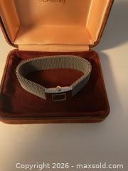 MaxSold Auction: Ladies Bellflower expansion watch  - Ottawa (Ontario, Canada) SELLER MANAGED Downsizing Online Auction - Tall Forest Drive