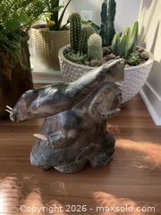 MaxSold Auction: Large vintage soapstone carving of hunter carrying seal - Ottawa (Ontario, Canada) SELLER MANAGED Downsizing Online Auction - Tall Forest Drive