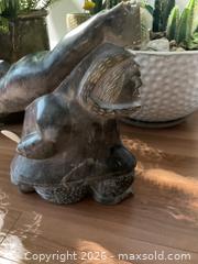 MaxSold Auction: Large vintage soapstone carving of hunter carrying seal - Ottawa (Ontario, Canada) SELLER MANAGED Downsizing Online Auction - Tall Forest Drive