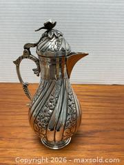 MaxSold Auction: Ornate Egyptian 900 silver lidded coffee pot (264 grams) - Ottawa (Ontario, Canada) SELLER MANAGED Downsizing Online Auction - Tall Forest Drive