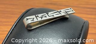 MaxSold Auction: Rare 1960s mid-century modernist Ed Levin sterling money clip - Ottawa (Ontario, Canada) SELLER MANAGED Downsizing Online Auction - Tall Forest Drive