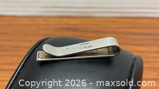 MaxSold Auction: Rare 1960s mid-century modernist Ed Levin sterling money clip - Ottawa (Ontario, Canada) SELLER MANAGED Downsizing Online Auction - Tall Forest Drive