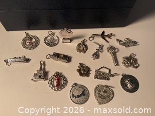 MaxSold Auction: Sterling silver charm bracelet and lots of additional charms (82.48 grams) - Ottawa (Ontario, Canada) SELLER MANAGED Downsizing Online Auction - Tall Forest Drive
