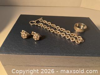MaxSold Auction: Sterling silver earrings, band and bracelet (21.25 grams) - Ottawa (Ontario, Canada) SELLER MANAGED Downsizing Online Auction - Tall Forest Drive