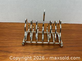 MaxSold Auction: Vintage sterling silver toast rack (128 grams) - Ottawa (Ontario, Canada) SELLER MANAGED Downsizing Online Auction - Tall Forest Drive