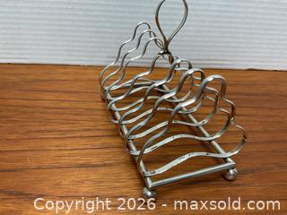 MaxSold Auction: Vintage sterling silver toast rack (128 grams) - Ottawa (Ontario, Canada) SELLER MANAGED Downsizing Online Auction - Tall Forest Drive