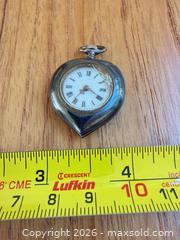 MaxSold Auction: Mixed Accessories Lot: Cufflinks, Watches, Pins, Medal - Saanich (British Columbia, Canada) PARTNER MANAGED Moving Online Auction - Arbutus Road