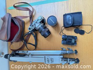 MaxSold Auction: Olympus OM-1 Film SLR Body with Mounted Zoom Lens and Accessories - Saanich (British Columbia, Canada) PARTNER MANAGED Moving Online Auction - Arbutus Road