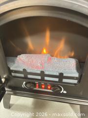 MaxSold Auction: Black Metal Electric Fireplace Stove, 1500W/750W - Ottawa (Nepean) (Ontario, Canada) SELLER MANAGED Moving Online Auction - Grenfell Crescent