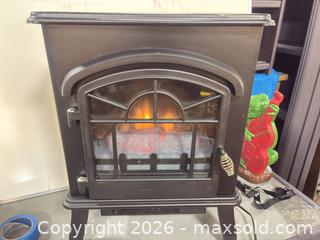MaxSold Auction: Black Metal Electric Fireplace Stove, 1500W/750W - Ottawa (Nepean) (Ontario, Canada) SELLER MANAGED Moving Online Auction - Grenfell Crescent