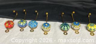 MaxSold Auction: 7 Hand-Painted Art Brass Hocks Pottery Mini Plates – Colorful Decorative Collectible Set - Campbell (California, USA) SELLER MANAGED Downsizing Online Auction - Dell Avenue