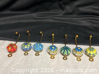 MaxSold Auction: 7 Hand-Painted Art Brass Hocks Pottery Mini Plates – Colorful Decorative Collectible Set - Campbell (California, USA) SELLER MANAGED Downsizing Online Auction - Dell Avenue