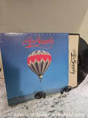 MaxSold Auction: AIR SUPPLY Record  - Kingston (Ontario, Canada) SELLER MANAGED Downsizing Online Auction - Morenz Cresecent