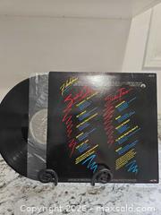 MaxSold Auction: "FLASHDANCE" Movie SOUNDTRACK Record  - Kingston (Ontario, Canada) SELLER MANAGED Downsizing Online Auction - Morenz Cresecent