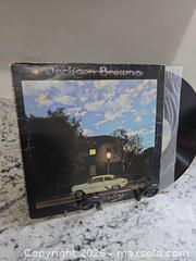 MaxSold Auction: JACKSON BROWNE Record  - Kingston (Ontario, Canada) SELLER MANAGED Downsizing Online Auction - Morenz Cresecent