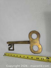 MaxSold Auction: Large Brass "21" Decor Key - Kingston (Ontario, Canada) SELLER MANAGED Downsizing Online Auction - Morenz Cresecent