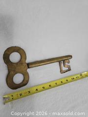 MaxSold Auction: Large Brass "21" Decor Key - Kingston (Ontario, Canada) SELLER MANAGED Downsizing Online Auction - Morenz Cresecent
