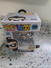 MaxSold Auction: NEW- TEEN TITANS GO-ROBIN w Baby Funko Pop Figure - Kingston (Ontario, Canada) SELLER MANAGED Downsizing Online Auction - Morenz Cresecent