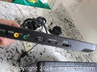 MaxSold Auction: PHILLIPS- DUAL Portable DVD System LOT"L4" - Kingston (Ontario, Canada) SELLER MANAGED Downsizing Online Auction - Morenz Cresecent