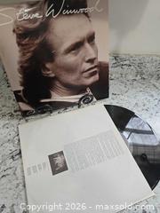 MaxSold Auction: STEVE WINWOOD Record  - Kingston (Ontario, Canada) SELLER MANAGED Downsizing Online Auction - Morenz Cresecent