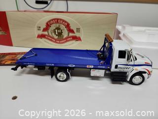 MaxSold Auction: 1 34 1st Gear International 4400 Slideback Carrier Die Cast Model - Ottawa (Ontario, Canada) SELLER MANAGED Downsizing Online Auction -  Cinnabar