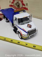 MaxSold Auction: 1 34 1st Gear International 4400 Slideback Carrier Die Cast Model - Ottawa (Ontario, Canada) SELLER MANAGED Downsizing Online Auction -  Cinnabar