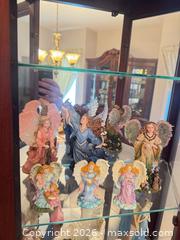 MaxSold Auction: 4 shelves of angels, pixies and other figurines  - Ottawa (Ontario, Canada) SELLER MANAGED Downsizing Online Auction -  Cinnabar