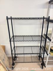 MaxSold Auction: Black metal rolling storage rack lot 317 - Ottawa (Ontario, Canada) SELLER MANAGED Downsizing Online Auction -  Cinnabar