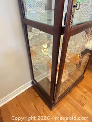 MaxSold Auction: Howard miller Light up glass display case  - Ottawa (Ontario, Canada) SELLER MANAGED Downsizing Online Auction -  Cinnabar