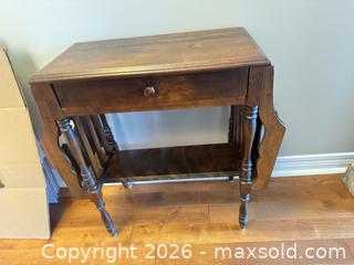 MaxSold Auction: Magazine rack entry table  - Ottawa (Ontario, Canada) SELLER MANAGED Downsizing Online Auction -  Cinnabar