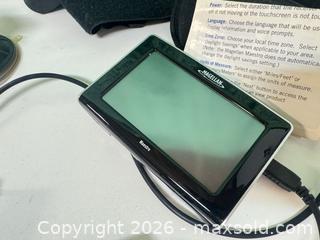 MaxSold Auction: Magellan car GPS  - Ottawa (Ontario, Canada) SELLER MANAGED Downsizing Online Auction -  Cinnabar