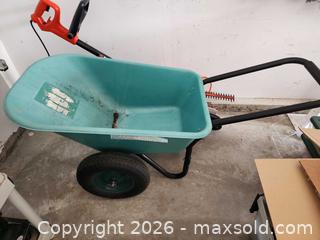 MaxSold Auction: Marks Choice Double Wheel Plastic Wheelbarrow - Ottawa (Ontario, Canada) SELLER MANAGED Downsizing Online Auction -  Cinnabar