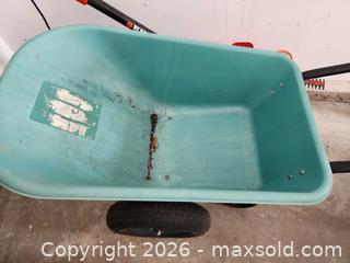 MaxSold Auction: Marks Choice Double Wheel Plastic Wheelbarrow - Ottawa (Ontario, Canada) SELLER MANAGED Downsizing Online Auction -  Cinnabar
