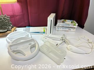 MaxSold Auction: Wii and components, Balance board, Mariokart, Tiger Woods PGA Tour 09, Super Mario Galaxy - Ottawa (Ontario, Canada) SELLER MANAGED Downsizing Online Auction -  Cinnabar