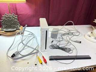 MaxSold Auction: Wii and components, Balance board, Mariokart, Tiger Woods PGA Tour 09, Super Mario Galaxy - Ottawa (Ontario, Canada) SELLER MANAGED Downsizing Online Auction -  Cinnabar