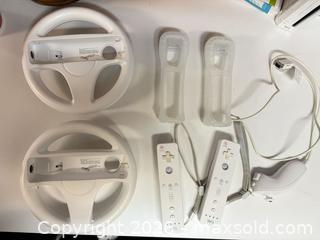 MaxSold Auction: Wii and components, Balance board, Mariokart, Tiger Woods PGA Tour 09, Super Mario Galaxy - Ottawa (Ontario, Canada) SELLER MANAGED Downsizing Online Auction -  Cinnabar