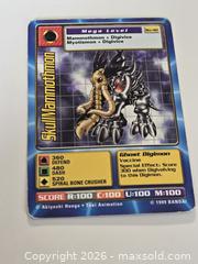 MaxSold Auction: Digimon Mammothmon & SkullMammothmon Cards  - Toronto (Ontario, Canada) SELLER MANAGED Downsizing Online Auction - McAdam Avenue