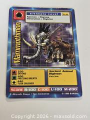 MaxSold Auction: Digimon Mammothmon & SkullMammothmon Cards  - Toronto (Ontario, Canada) SELLER MANAGED Downsizing Online Auction - McAdam Avenue