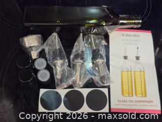 MaxSold Auction: FineDine Glass Oil Dispenser with Accessories - Toronto (Ontario, Canada) SELLER MANAGED Downsizing Online Auction - McAdam Avenue