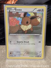 MaxSold Auction: Pokemon Dark Explores Eevee Card NM 83/108 - Toronto (Ontario, Canada) SELLER MANAGED Downsizing Online Auction - McAdam Avenue