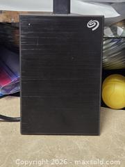 MaxSold Auction:  Seagate One Touch 1TB External Hard Drive - Toronto (Ontario, Canada) SELLER MANAGED Downsizing Online Auction - McAdam Avenue