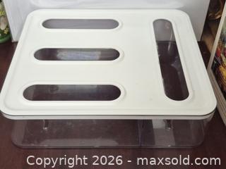 MaxSold Auction: Slotted Lid Plastic Bags Organizer Like New - Toronto (Ontario, Canada) SELLER MANAGED Downsizing Online Auction - McAdam Avenue