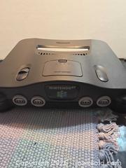 MaxSold Auction: Nintendo 64 game console with special green controller - Toronto (Ontario, Canada) SELLER MANAGED Estate Sale Online Auction - Saunders Road