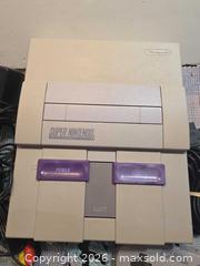 MaxSold Auction: Super Nintendo game console With controller And adapters - Toronto (Ontario, Canada) SELLER MANAGED Estate Sale Online Auction - Saunders Road