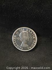MaxSold Auction: 1963 Silver 50 Cent Coin  - Loyalist (Ontario, Canada) SELLER MANAGED Downsizing Online Auction - Somerset Drive