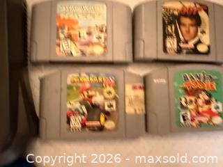 MaxSold Auction: Nintendo 64 black & games  - Toronto (Ontario, Canada) SELLER MANAGED Downsizing Online Auction -  Palamar Road