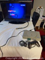 MaxSold Auction: Official Sony PlayStation 1 PS1 Console Complete w Controller!  - Toronto (Ontario, Canada) SELLER MANAGED Downsizing Online Auction -  Palamar Road