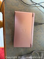 MaxSold Auction: Vintage Nintendo DS Handheld System Metallic Pink  - Toronto (Ontario, Canada) SELLER MANAGED Downsizing Online Auction -  Palamar Road